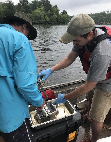 sampling lake sediment